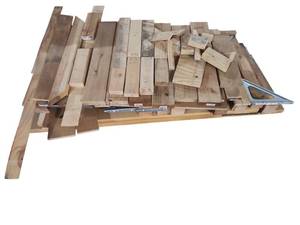 lot 512 image: Assorted Lumber and Wood Scrap Lot with Metal Speed Square and Framing Brackets