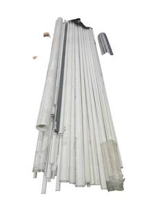 lot 516 image: Lot of Assorted Lengths and Diameters of White PVC Pipe w Gray Rod