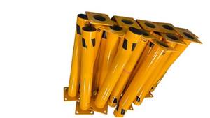 lot 732 image: Yellow Protective Guard Post Lot with Black Chevron Stripes and Base Plates