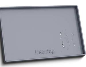 lot 2592 image: 34 x 22 Extra Thick Silicone Mat Waterproof with Raised Edge, - Retail $20