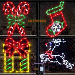 lot 1045 image: Pytopkto Christmas Decorations - 16 Christmas Window Silhouette Lights - Retail $40
