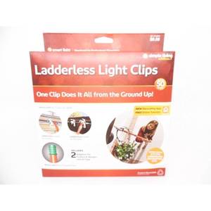 lot 1075 image: Simple Living Ladderless Light Clips 50ct Includes 2 Adapters Gutters & Shingles - Retail $30