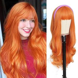 lot 213 image: AISI QUEENS Orange Ginger Wig with Bangs Long Wavy Orange Wig for Women Halloween Daphne Cosplay Wig Use Heat Resistant Synthetic - Retail $29