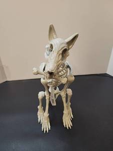 lot 71163 image: Skeleton Dog Figurine with Bone Approximately 11 inches - Retail $10