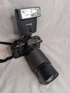 lot 1001 image: Pentax P3 SLR Camera with Vivitar 75-200mm 14.5 Macro Zoom Lens