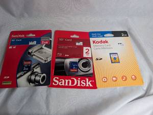 lot 1009 image: SD Memory Card 2GB- Lot of 3 (SanDisk and Kodak)