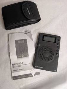 lot 1101 image: Grundig Super Compact AMFMSW Clock Radio Digital Display M400