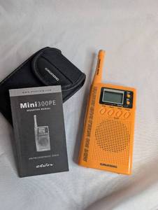 lot 1102 image: Grundig Mini 300 AMFM StereoSW Clock World Band Receiver Radio