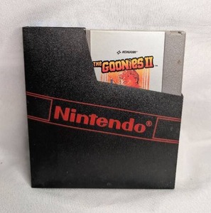lot 1303 image: Konami The Goonies II Video Game Cartridge with Nintendo Sleeve