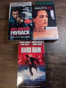 lot 1424 image: VHS Lot of 3 Action Crime, Psychological Thriller Tapes Payback, Sleeping with the Enemy, Hard Rain - Sealed