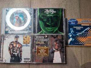 lot 1428 image: Lot of 5 CDs 50 Cent, Ruben Studdard, Black Eyed Peas, Mac, American Idol Karaoke