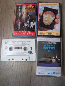 lot 1449 image: Music Cassette Lof of 4 1980s Pop and Move Soundtrack Tapes Prince and the Revolution from Purple Rain, Thompson Twins Miami Vice II Dragnet