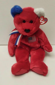 lot 6747 image: ENCASED Ty Beanie Babies Plush Bear with American Flag Patch - Retail $0