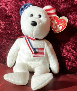 lot 6750 image: ENCASED Ty Plush Bear White with American Flag Embroidery and Heart Tag - Retail $0