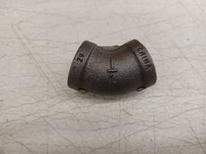 lot 13470 image: Jones Stephens 12in 45 Degree Black Malleable Iron Elbow Fittings Case of 200