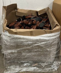 lot 191756 image: Retails Over $2,000 Pallet full of new, like-new, and used dress shoes. Varying colors and sizes (Brown, Black, & White).