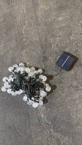 lot 117 image: Solar String Lights with Clear Globe Bulbs and Solar Panel - Retail $30