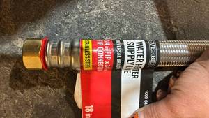 lot 166 image: Everbilt Water Heater Supply Line 18 in 34 in FIP x 34 in FIP Stainless Steel - Retail $13
