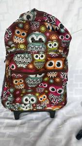 lot 2008 image: Rockland Owl Print Rolling Backpack with Telescoping Handle&nbsp