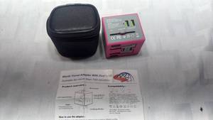 lot 2041 image: World Travel Adapter with Dual USB Ports and Carrying Case&nbsp