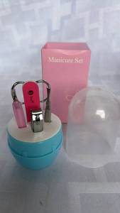 lot 2092 image: Manicure Set Blue Round Case with Nail Clipper, Scissors and Buffer&nbsp