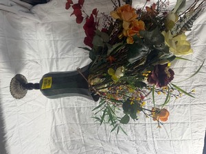 lot 36283 image: Flowers in a dark pedestal urn