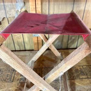 lot 3 image: Folding Stool with Red Fabric Seat and X-Frame Legs see pics & desc