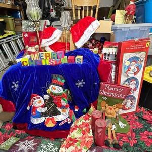 lot 145 image: Christmas Decor Lot Tree Skirt, Stockings, Santa Hats, Wall Plates, MantleClips
