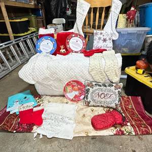 lot 148 image: Assorted Christmas Decor Lot Stockings, Pillows, Plates, Table Linens