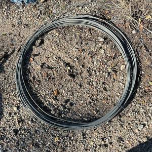 lot 187 image: Coil of Gray Wire Bundled - commonly used with chainlink
