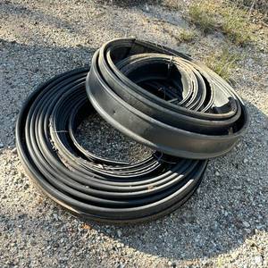 lot 188 image: Two Coils of Black Flexible Landscape Edging