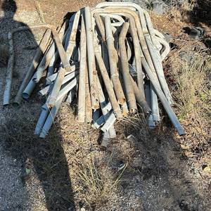 lot 191 image: Lot of Bent Metal Tubing Sections, Round and Flattened Ends - likely scrap - once was trampoline