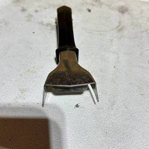 lot 201 image: Corning Ware Metal Tool with Black Handle Pat. No. 2,854,279