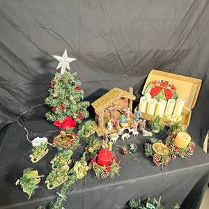 lot 210 image: Christmas Decor Lot with Nativity Set, Tabletop Tree, Candles, Garland