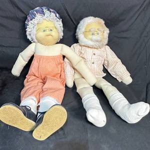 lot 309 image: Grandmother and Grandfather Doll Pair with Glasses 2 Count