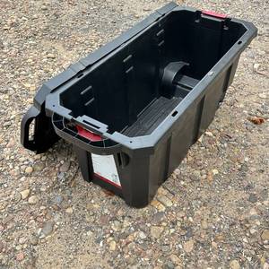 lot 345 image: Husky 45 Gallon Latch and Stack Tote with Wheels 1 of 2 appears unused but dusty top