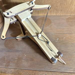lot 362 image: Small Wooden Tabletop Crossbow Model with Stand and Black Cord String