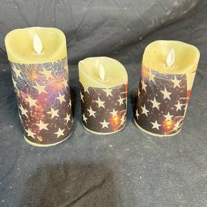 lot 406 image: $1 Start - Set of 3 LED Pillar Candles with Star Print Sleeves