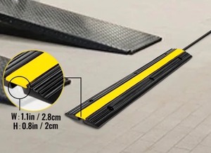 lot 31 image: 1-Channel Rubber Cable Protector Ramps Heavy Duty 22046Lbs Load Capacity Cable Wire Cord Cover Ramp Speed Bump Driveway Hose Cable Ramp Protective Cover