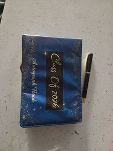 lot 130 image: Class of 2026 Autograph Book, Damaged Sold as Is  - Retail $0