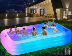 lot 2985 image: QIUJIN Large Solar Inflatable Pool with Lights, 130x72x22, Oversized Thickened Blow Up Pool with Pump, 7 Color Changed Family Swimming Pool for Backyard, Outdoor - Retail $60