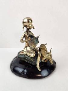 lot 103 image: Brass-Tone Girl Reading with Dog Sculpture on Wood Base