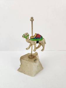 lot 118 image: Carousel Camel Figurine on Pole with Rough Stone Base, Signed Judi