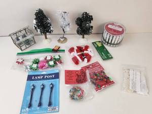 lot 151 image: Miniature Christmas Village Accessory Lot HO Scale Lamp Posts Trees Santa Suit
