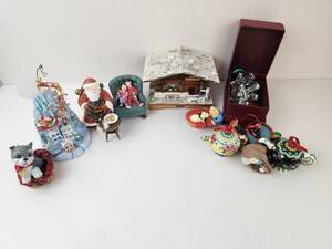 lot 152 image: Christmas Ornament and Figurine Lot Santa Teapot Schnauzer Cabin Sleigh