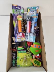 lot 174 image: Assorted Toy Figures Lot with PEZ Candy Dispensers and Playmates TMNT Figure