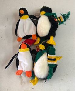 lot 134 image: Penguin TY Beanie Baby Lot of 4