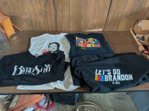 lot 44 image: Lot of 4 Graphic T-Shirts KMUW 89.1 SciFri, Byrd Shit Merch, Lets Go Brandon
