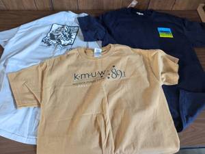 lot 48 image: KMUW 89.1 Wichita Public Radio T-Shirt Lot of 3 Fall 2014 Spring 2013