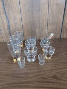 lot 72 image: Clear Glassware Lot Assorted Sizes Gold-Colored Bases